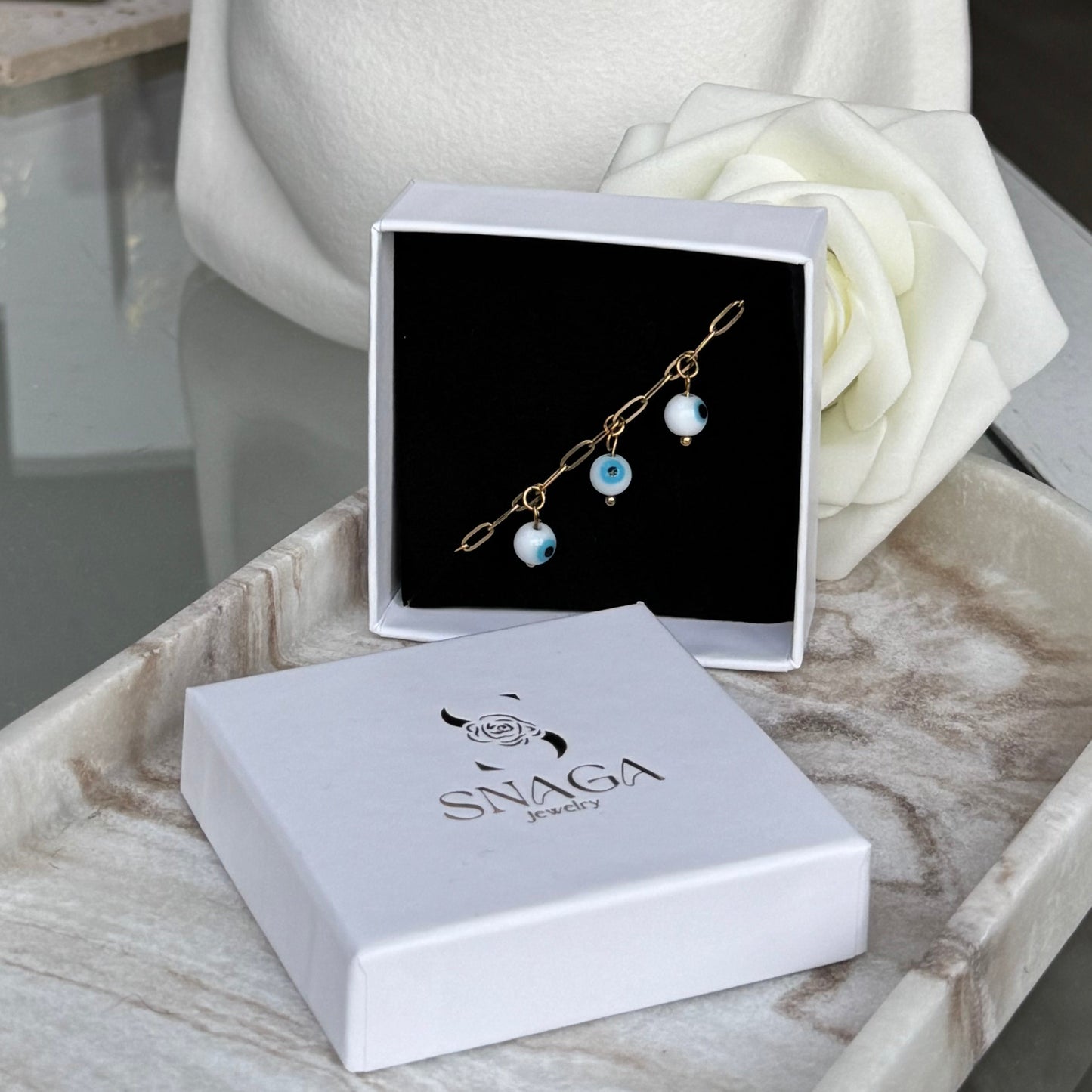 ELENA - Bracelet création en acier Inoxydable doré et perles œil de protection