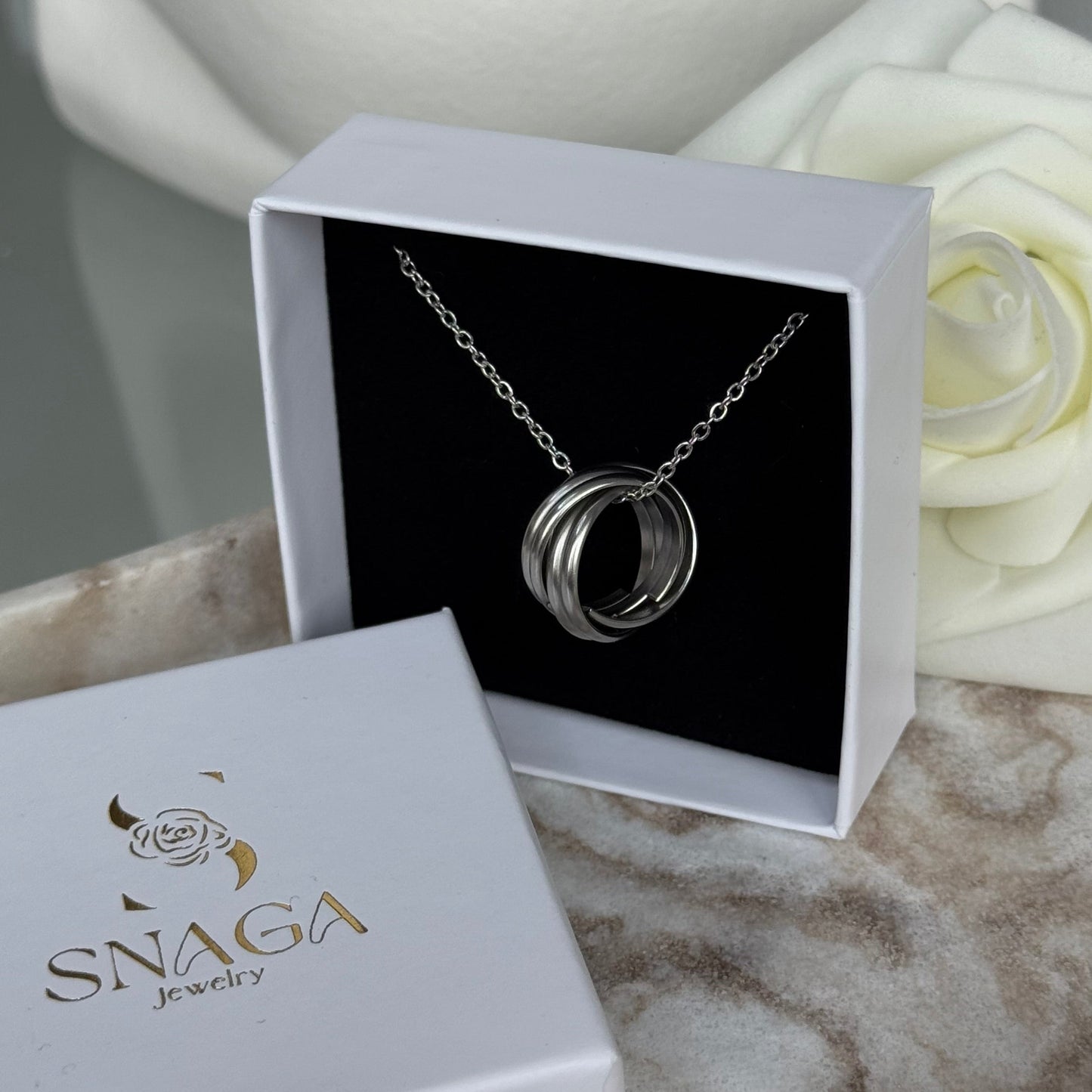 MELINA - Collier en acier Inoxydable argenté et pendentif anneaux