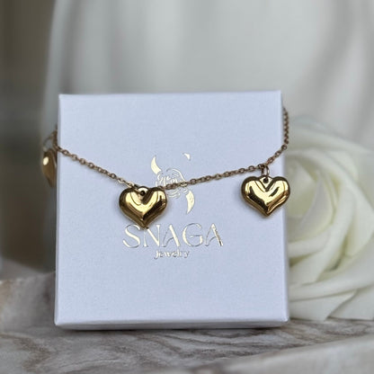 IZIA - Bracelet création en acier Inoxydable doré et pendentifs cœur