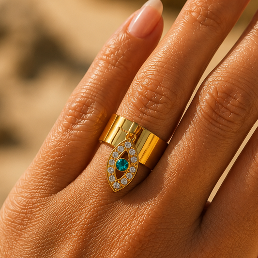 ZORA - Bague création en acier Inoxydable doré et pendentif œil à strass