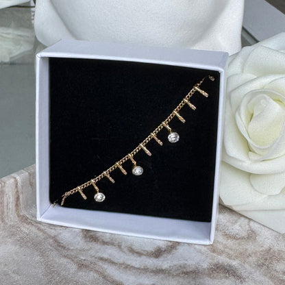 LOLA - Bracelet en acier Inoxydable doré avec pampilles et strass