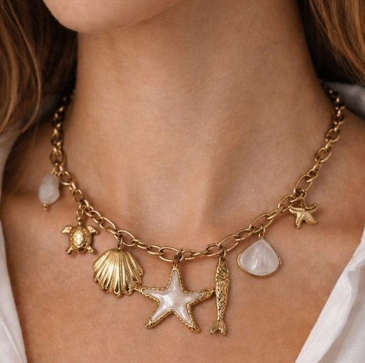 ALEXIANE – Collier charms coquillage et étoile en acier inoxydable doré