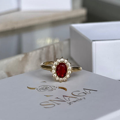 MEGANE - Bague en acier Inoxydable doré et zircon rouge