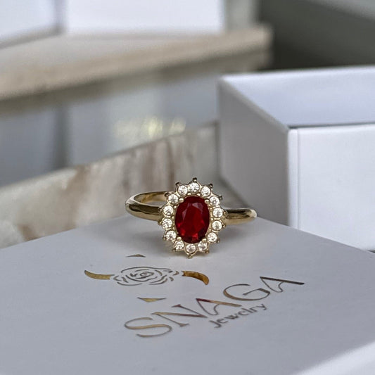 MEGANE - Bague en acier Inoxydable doré et zircon rouge