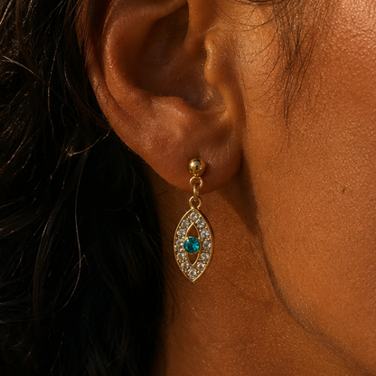 ZORA STUD – Boucles d’oreilles œil en acier inoxydable doré et strass bleus