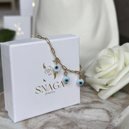 ELENA - Bracelet création en acier Inoxydable doré et perles œil de protection