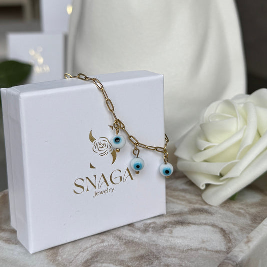 ELENA - Bracelet création en acier Inoxydable doré et perles œil de protection