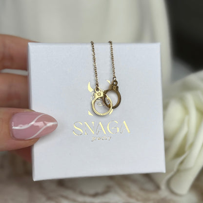 AURELIE - Bracelet en acier Inoxydable doré détails menottes