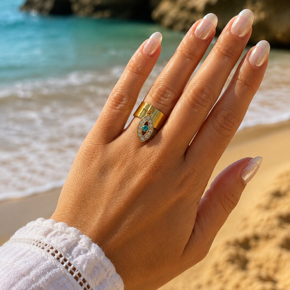 ZORA - Bague création en acier Inoxydable doré et pendentif œil à strass