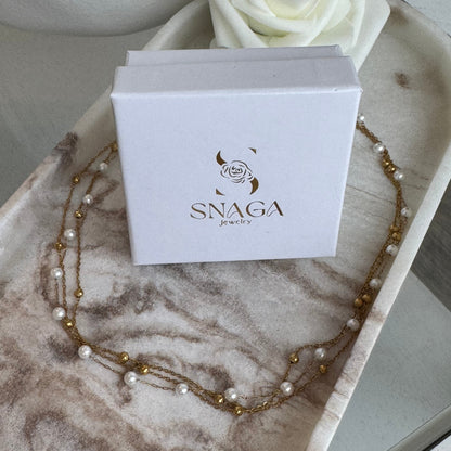 MARLENE - Collier ras de coup multi-chaine en acier Inoxydable Doré et perles blanches