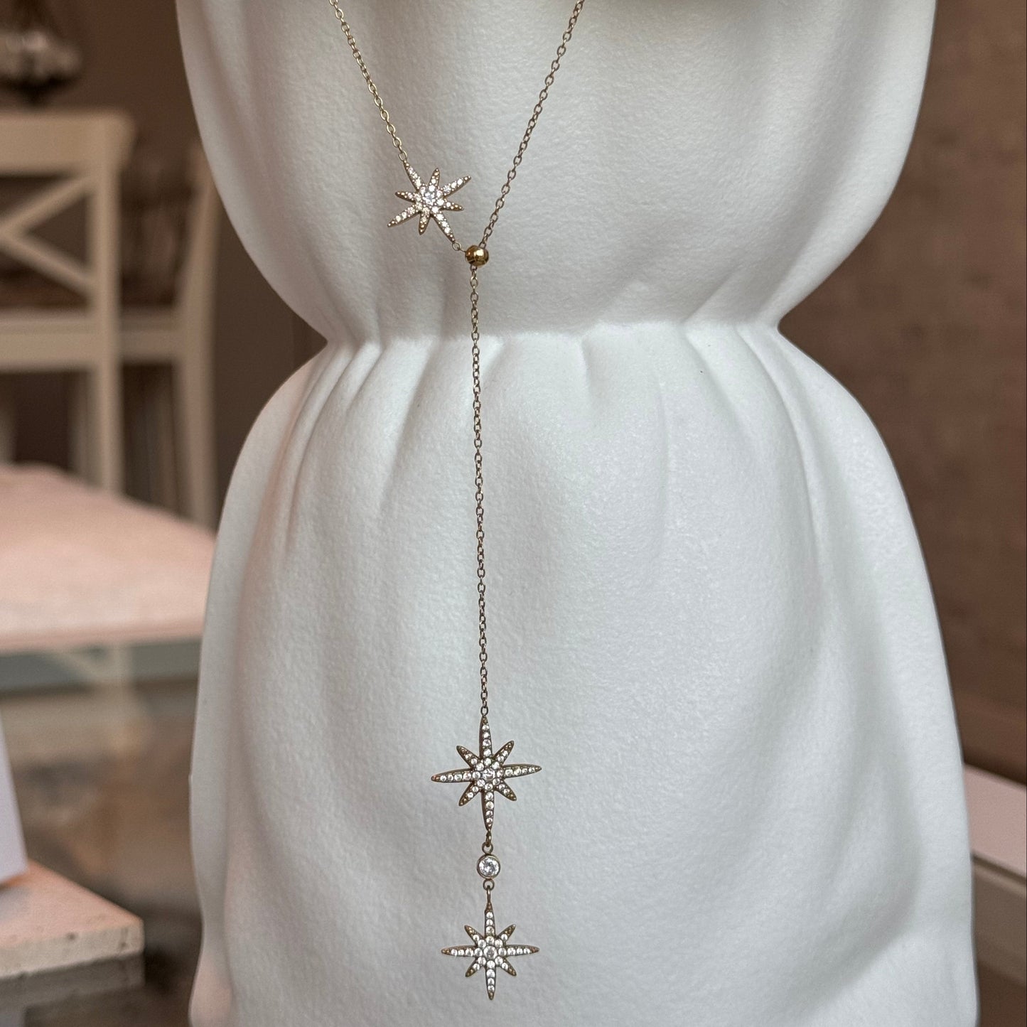 LOUISE - Collier Y en acier Inoxydable et pendentif étoiles dorées incrustées de zircons