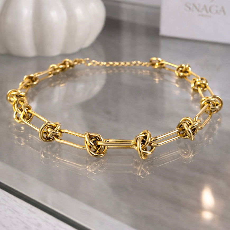 SÉDUCTION – Bracelet nœuds en acier inoxydable doré