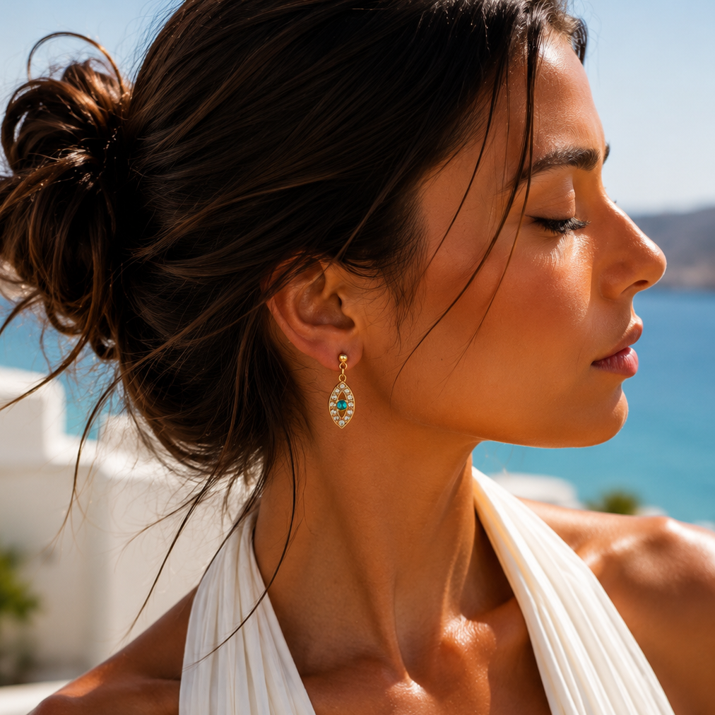 ZORA STUD – Boucles d’oreilles œil en acier inoxydable doré et strass bleus