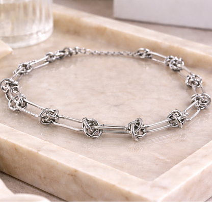 SÉDUCTION – Bracelet nœuds en acier inoxydable argenté