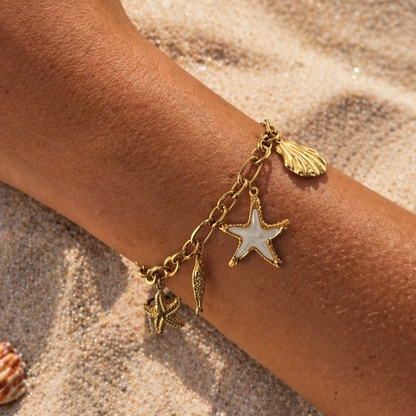 ALEXIANE – Bracelet charms coquillage en acier inoxydable doré