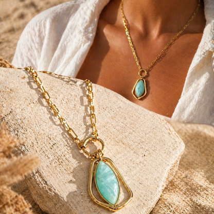 ISA - Collier en acier Inoxydable doré et zircon bleu