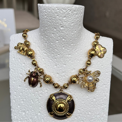 ABIGAIL - Collier en acier Inoxydable doré et gros pendentifs