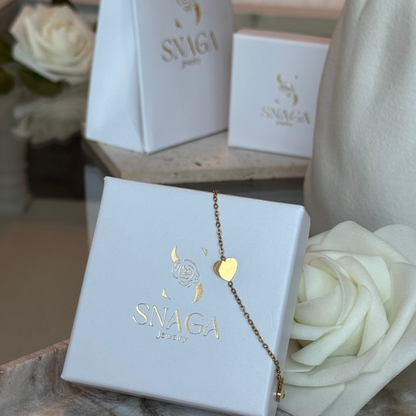 AURORE - Bracelet création en acier Inoxydable doré et pendentifs cœur